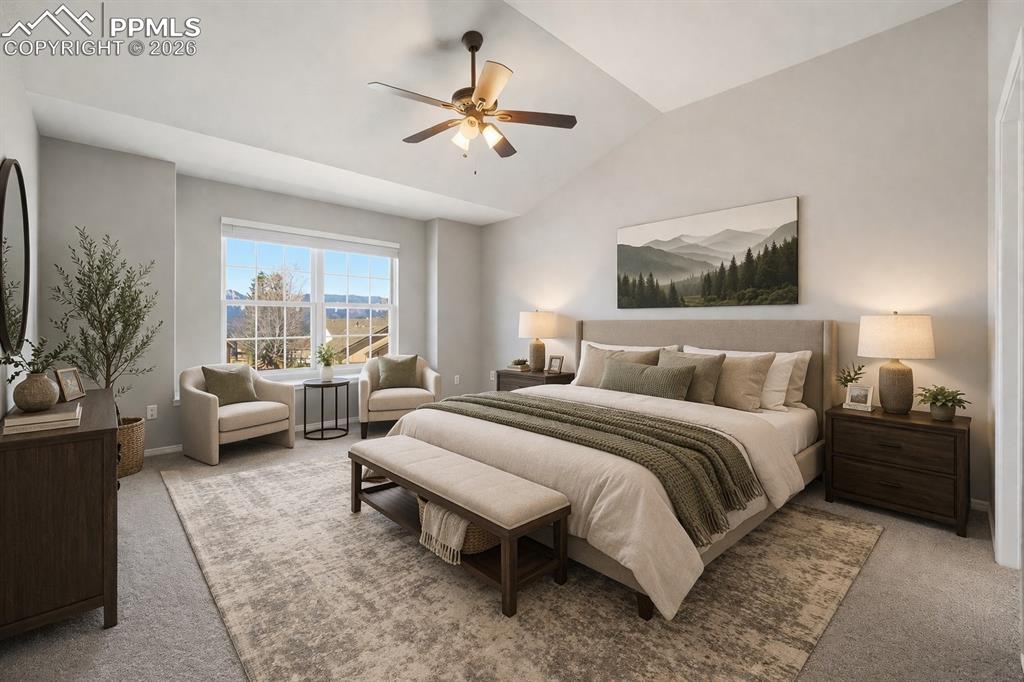 Image 21 of 49: Large cozy primary retreat with 5pc bath and walk-in closet