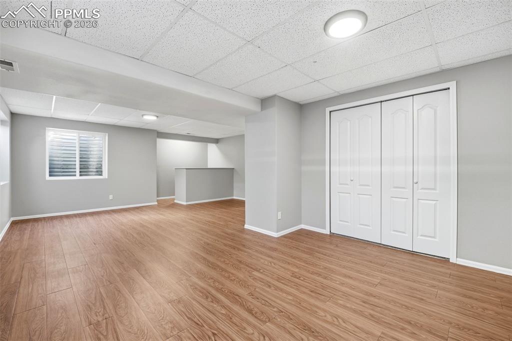 Image 34 of 49: Great for family room, rec area, game room with wet bar