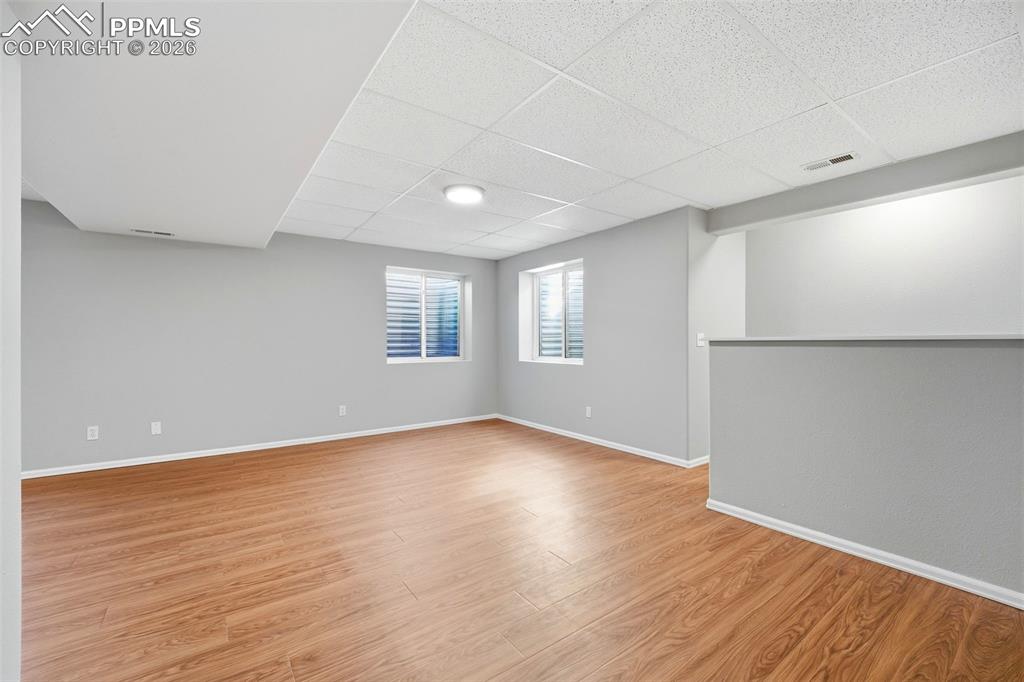 Image 36 of 49: Great for family room, rec area, game room with wet bar