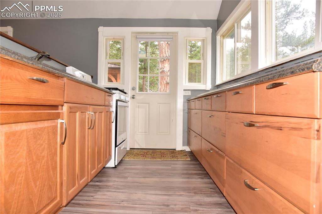 Image 13 of 46: Entryway with light wood-type flooring