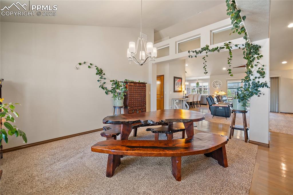 Image 3 of 50: Just off the entry is the formal dining space