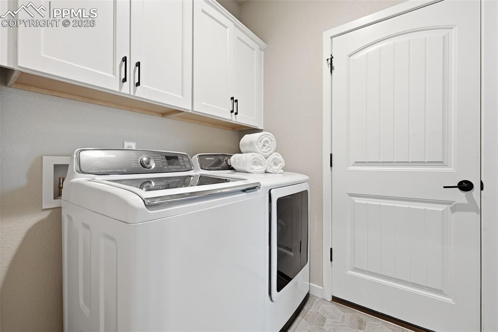 Image 19 of 47: Laundry room attached to Master closet and garage