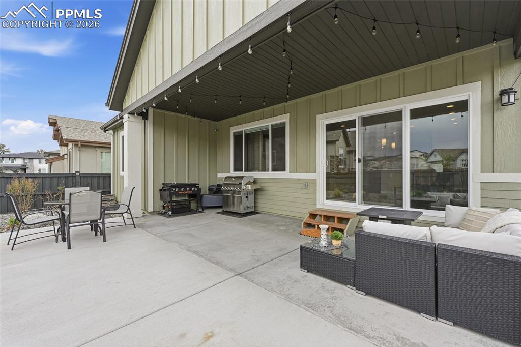 Image 31 of 47: Extended patio in the back yard