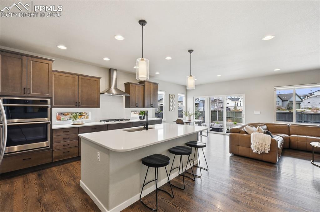 Image 4 of 47: Upgraded cabinets and quartz countertops