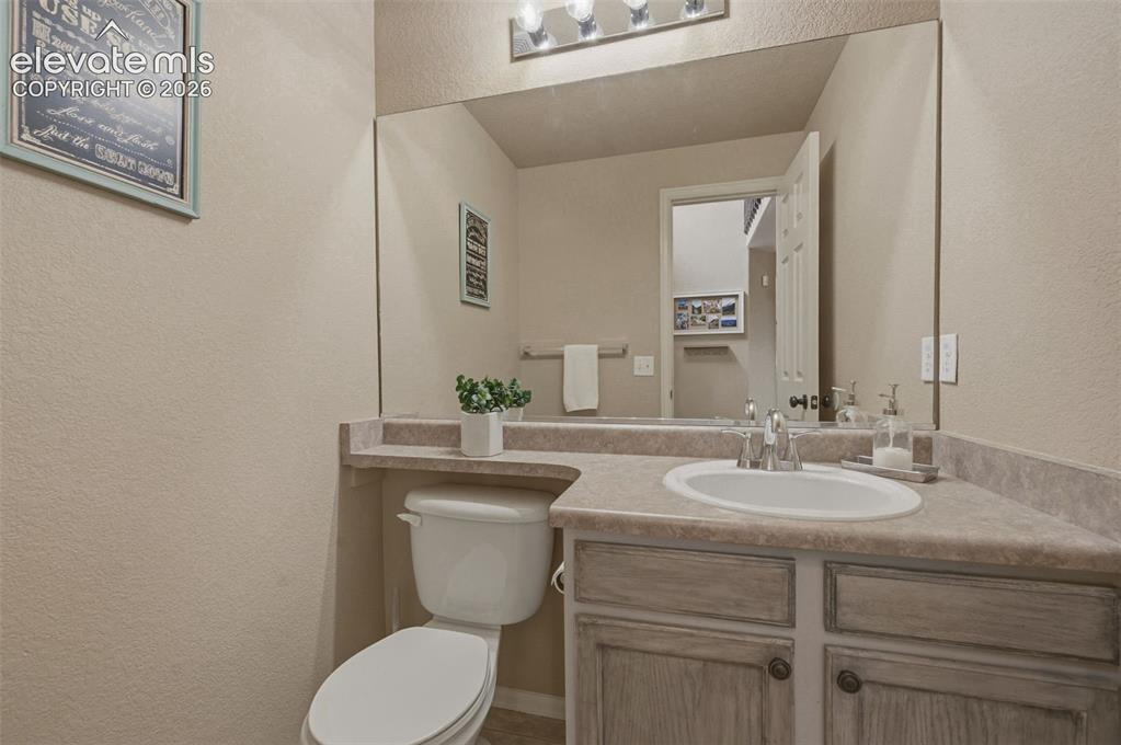 Image 6 of 48: 1/2 Bath at Entry