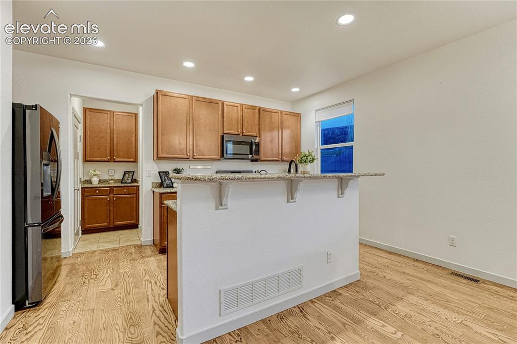 Image 9 of 38: Just Add Bar Stools!