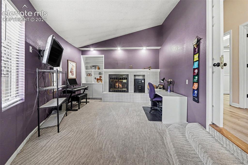Image 12 of 31: As you enter this unique office space it is totally for the creative heart.