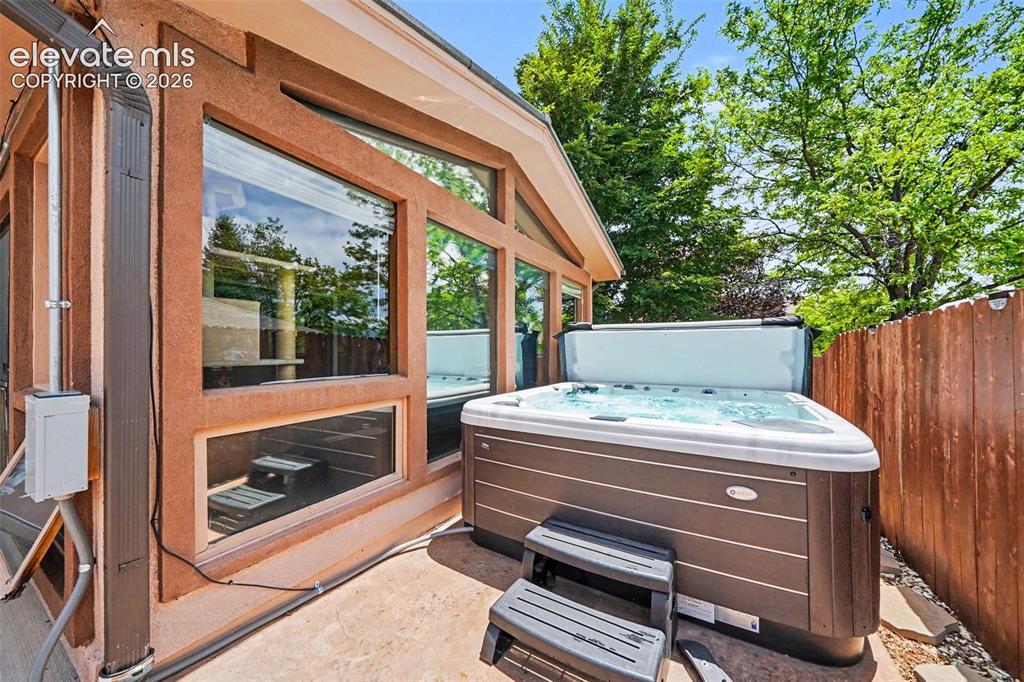 Image 25 of 31: Private Hot tub Area with steps. 