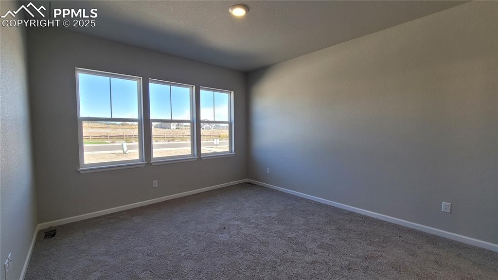 Image 15 of 36: Primary Bedroom with a plush bathroom and walk-in closet! Please, excuse ou