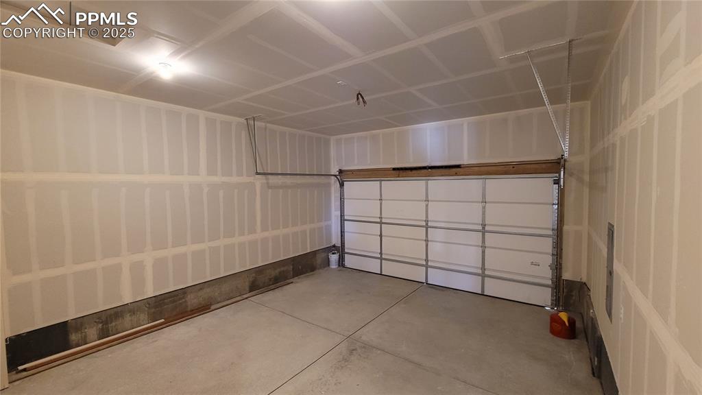 Image 30 of 36: Attached 2-Car Alley Garage! Please, excuse our dust as this home is curren