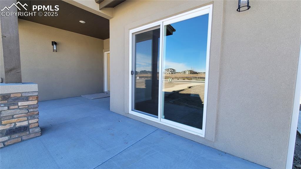 Image 5 of 36: Patio off the dining area! Please, excuse our dust as this home is currentl