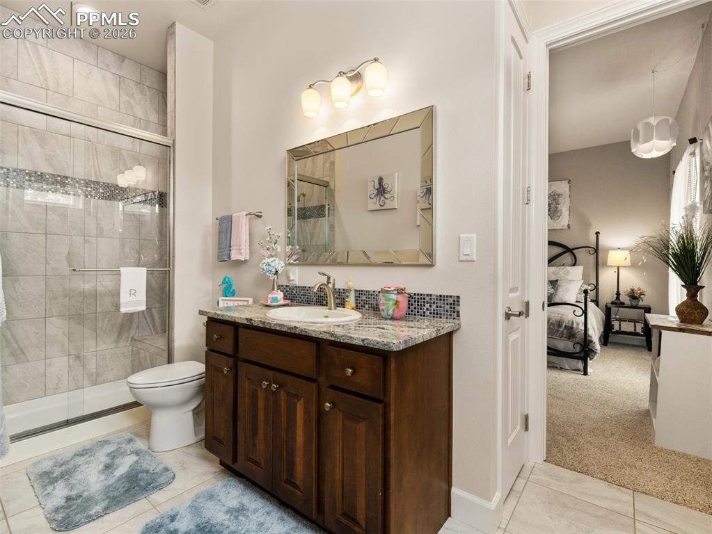 Image 25 of 44: Connected Bathroom