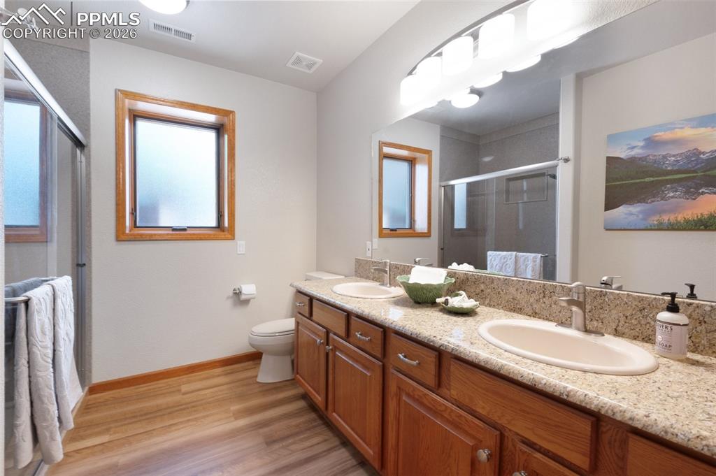 Image 35 of 50: Full Bath With Double Sinks