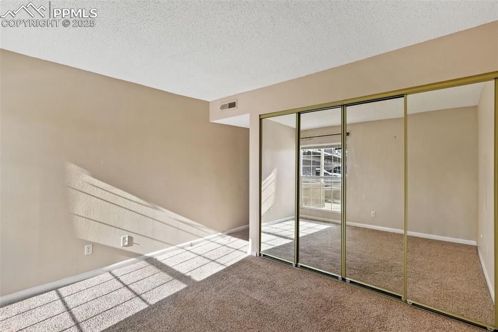 Image 11 of 19: Bedroom