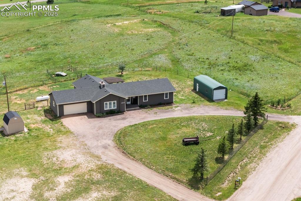 Image 6 of 39: Overview of rural landscape featuring agricultural land