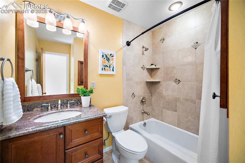 Image 17 of 48: Updated full bath. 