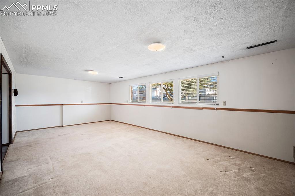 Image 26 of 48: Large windows allow for natural light. 