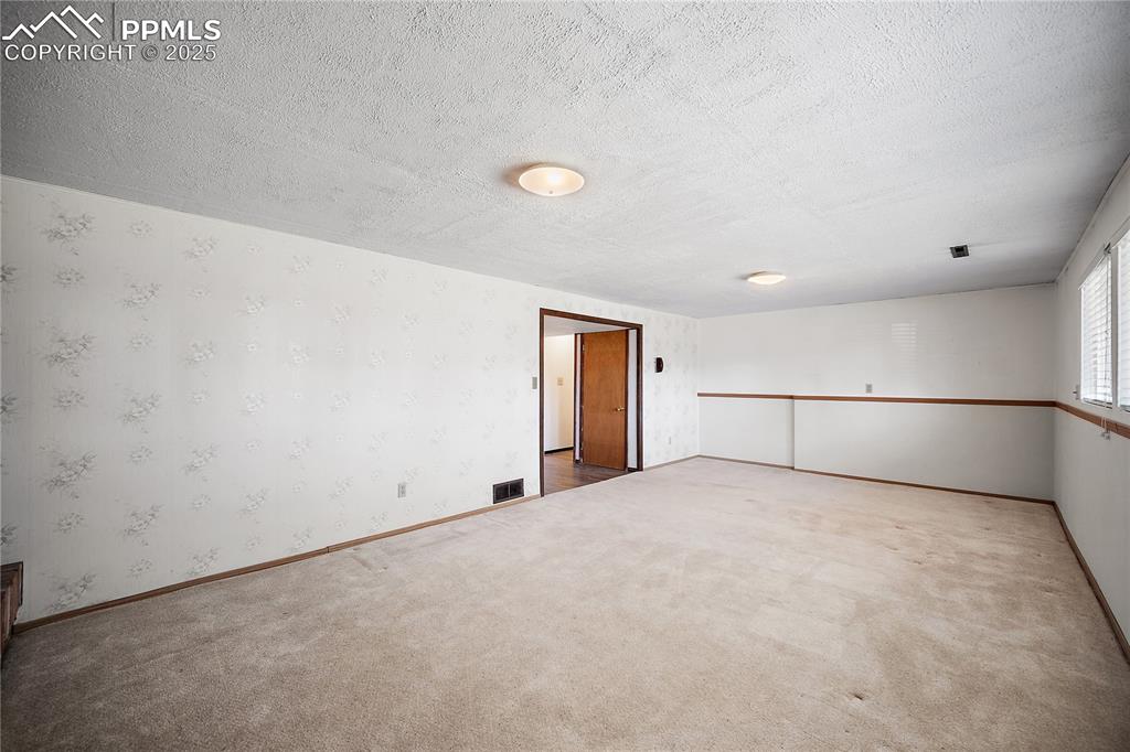 Image 27 of 48: Endless possibilities in this family/rec room. 