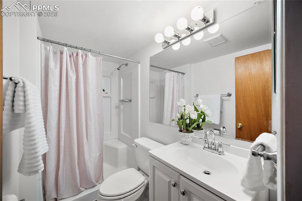 Image 28 of 48: Lower level updated 3/4 bath. 