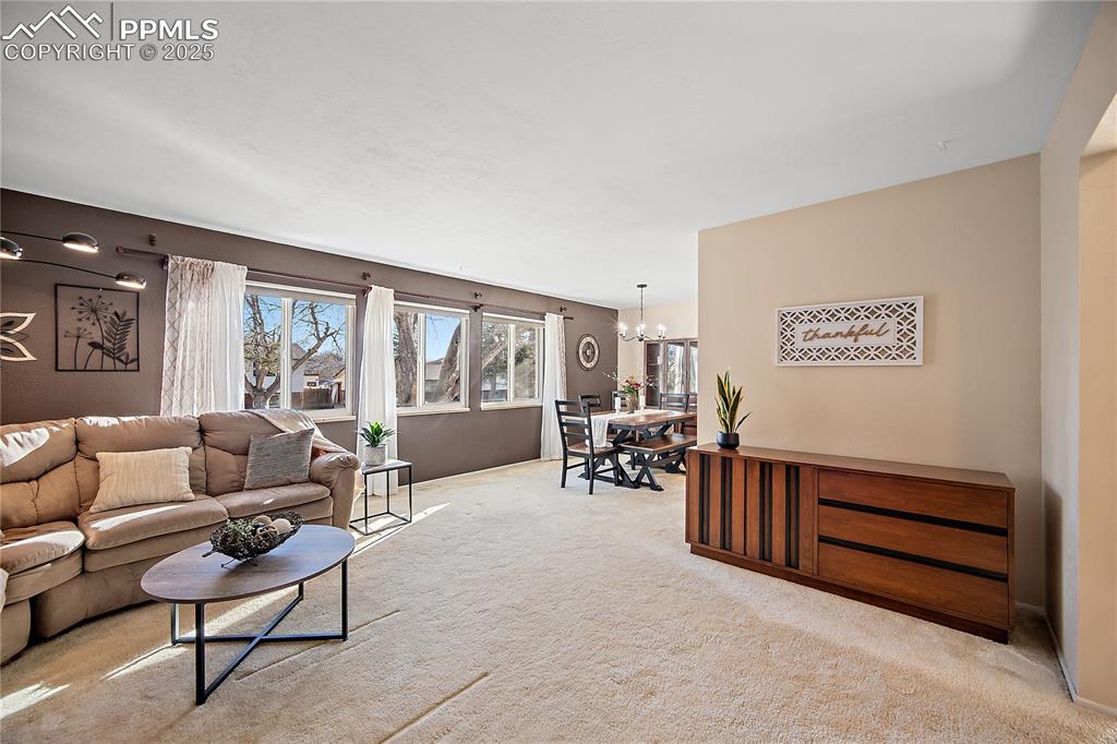 Image 9 of 48: Open to the dining room. Perfect for entertaining. 