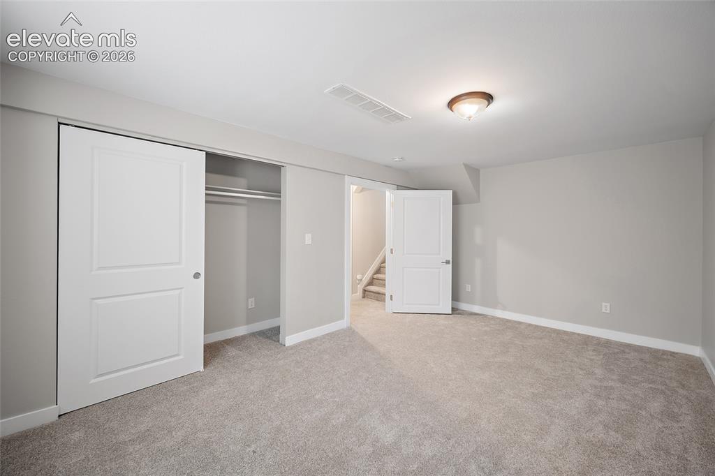 Image 19 of 36: Bedroom