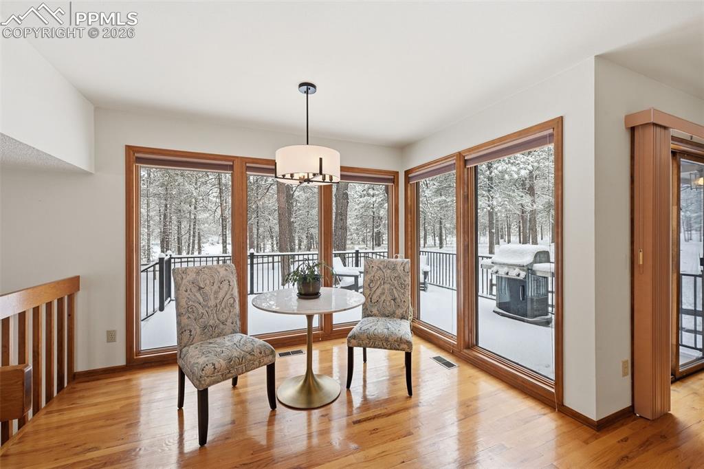 Image 12 of 45: Nook off of the kitchen with walk out to deck!