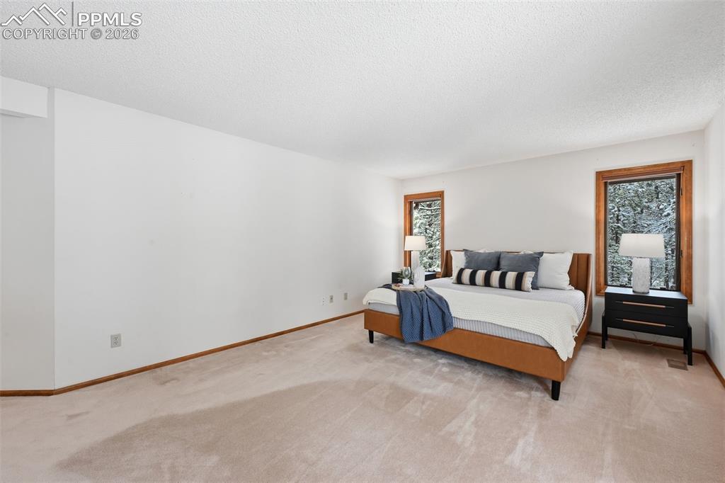 Image 26 of 45: So much room in the Master Bedroom Retreat!