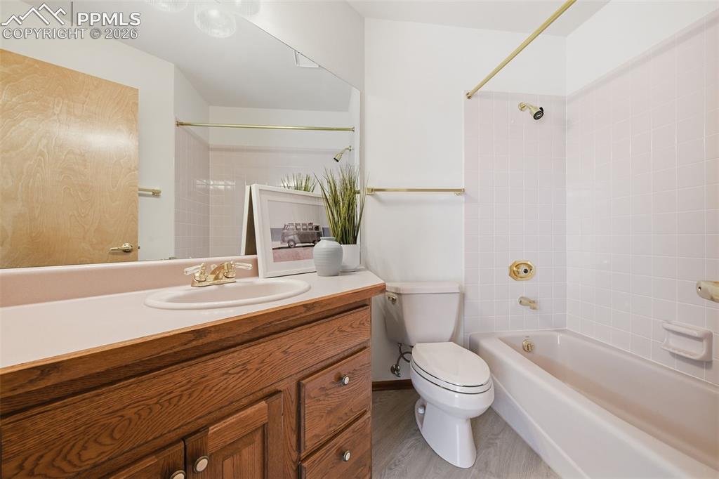 Image 31 of 45: Spacious full bath with upgraded floors!