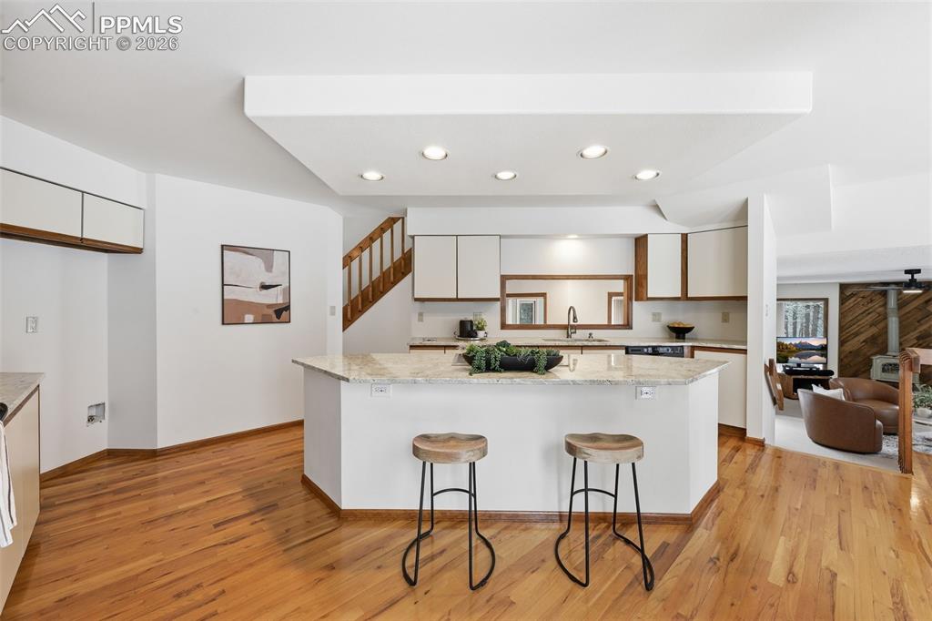 Image 9 of 45: Huge kitchen with center island and granite counters!