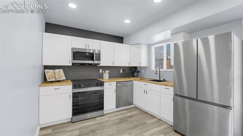 Image 14 of 44: Brand new stainless-steel appliances