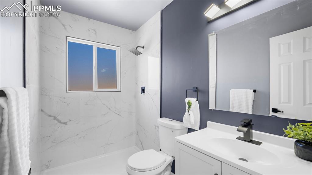 Image 18 of 44: New tile shower and bathroom