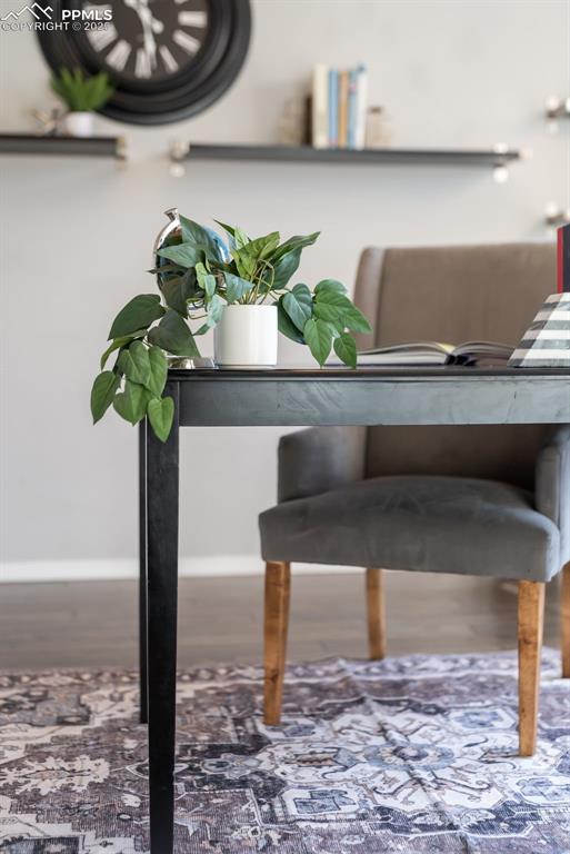 Image 17 of 50: Detailed view of baseboards and wood finished floors