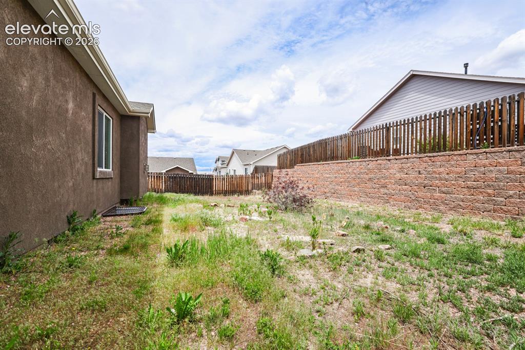 Image 36 of 38: Side yard.
