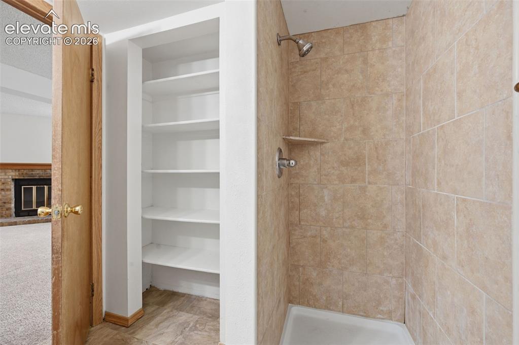 Image 21 of 29: Bathroom with storage.