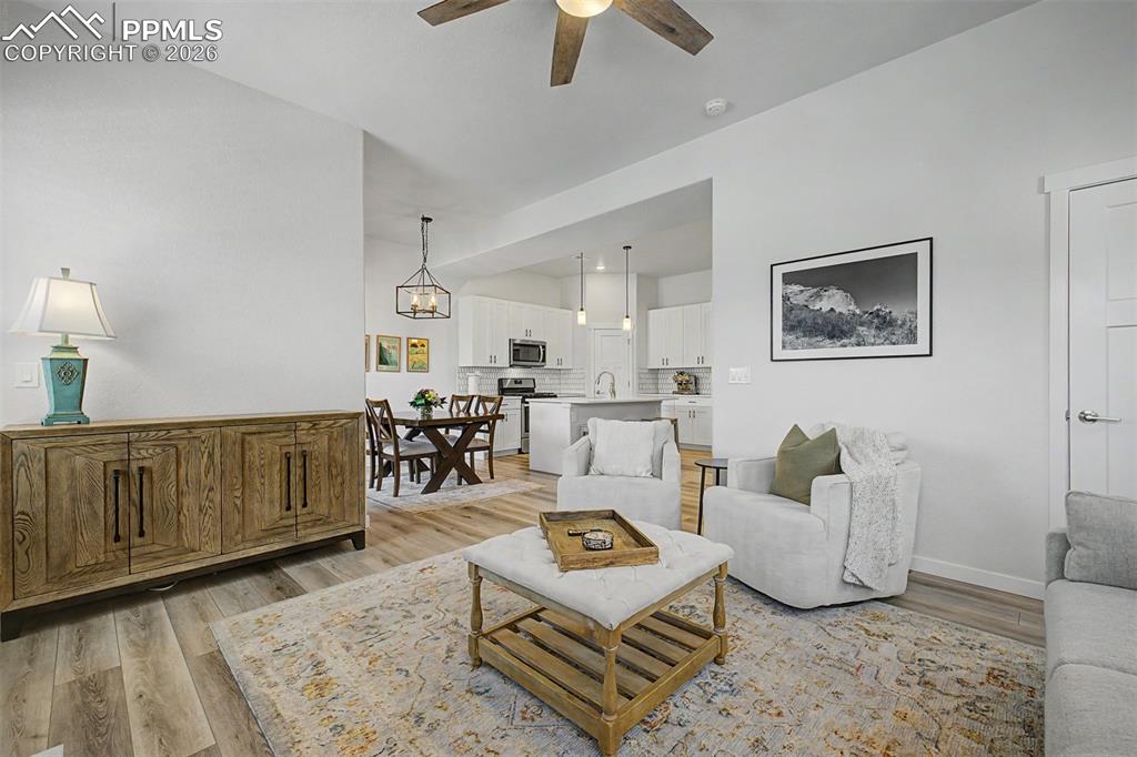 Image 11 of 39: The true heart of this home comes into view — a seamlessly connected living