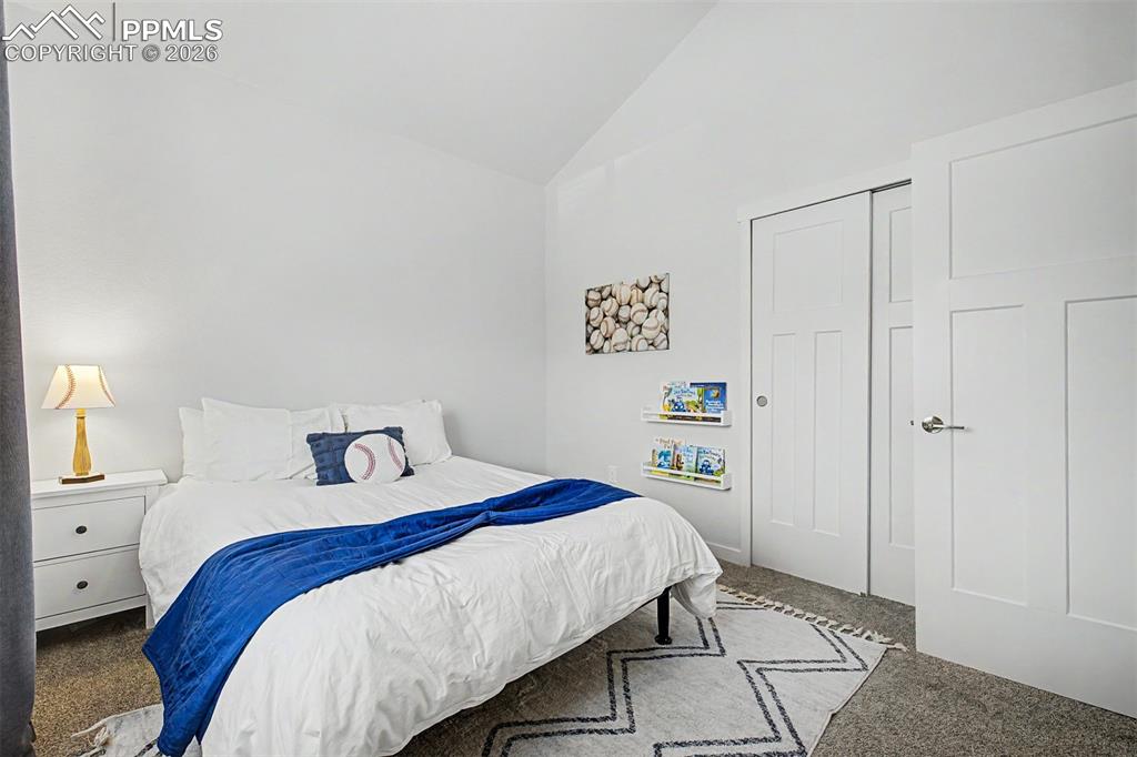 Image 25 of 39: A closer look at this fun secondary bedroom shows its versatility.