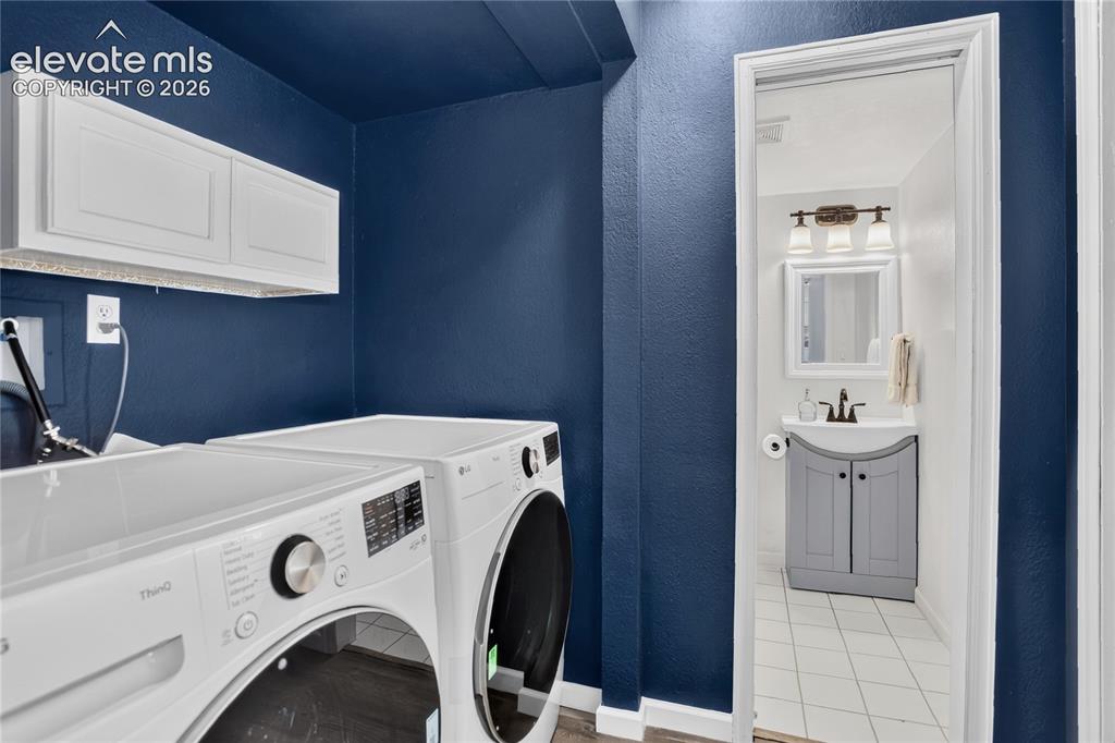 Image 17 of 20: Laundry space - lower level