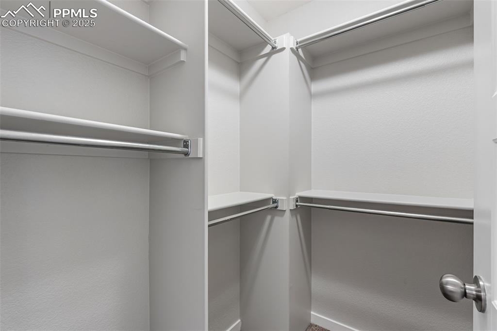 Image 21 of 50: View of walk in closet