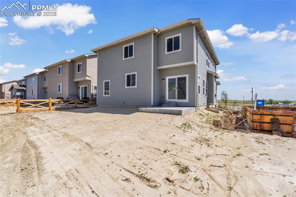 Image 35 of 39: Rear view of property with a fenced backyard and a patio