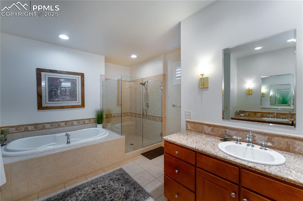 Image 11 of 36: Main Primary Bathroom