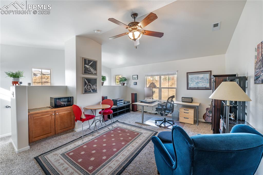 Image 19 of 36: Upstairs den/office/living room