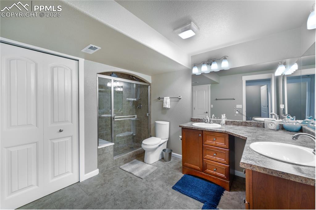 Image 35 of 36: Additional Primary Suite basement bathroom