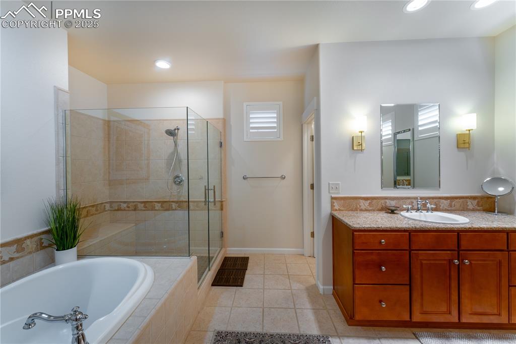 Image 9 of 36: Main Primary Bathroom