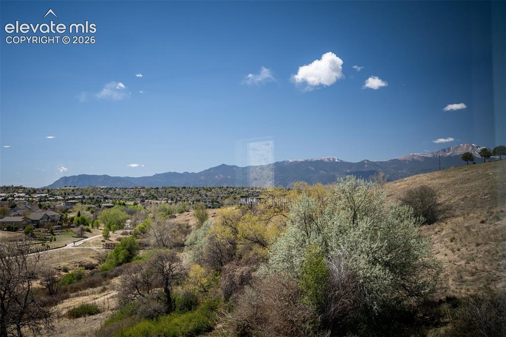 Image 17 of 45: Expansive mountain range backdrop and distant snow-capped peaks