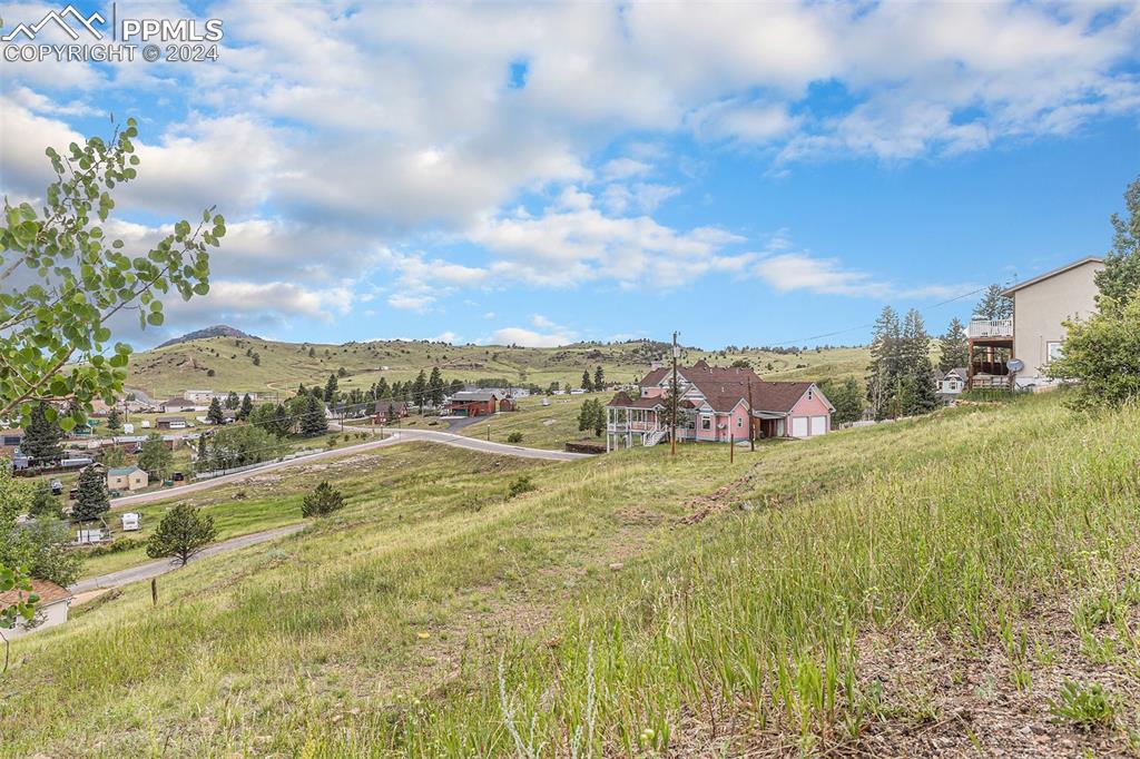 Image 10 of 19: View of property looking west from Hayden Street
