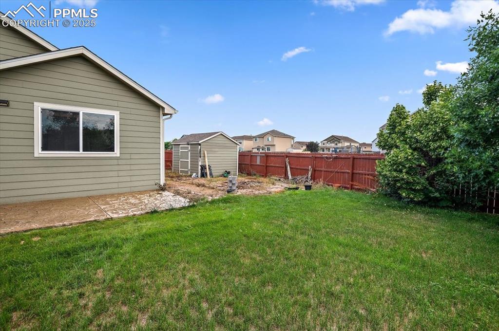 Image 3 of 35: View of yard with a patio area