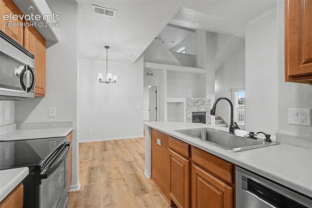 Image 8 of 23: New SS deep sink and recessed lighting