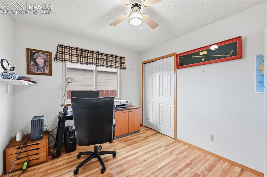 Image 31 of 39: Secondary bedroom currently use as an office