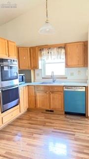 Image 40 of 50: Kitchen featuring stainless steel double ovens, Band new dishwasher