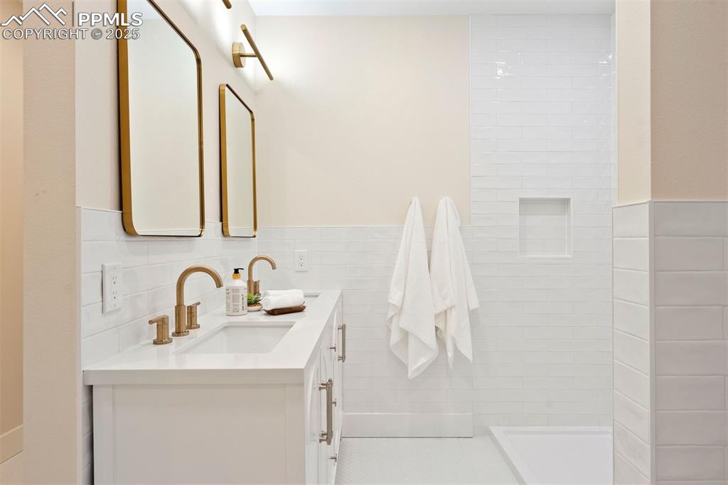 Image 23 of 39: Heated tile floors.